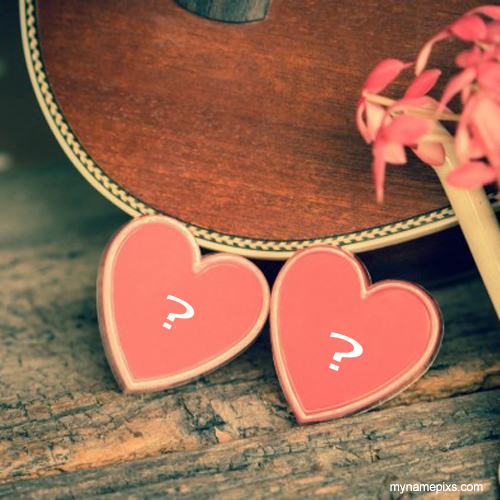 Write Your Alphabet On Beautiful Couple Red Heart Pic.